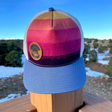 colorado flag hat, colorado flag trucker hat, mt blue sky hat, mount blue sky trucerk hat, mt. evans hat, mount evans trucker hat, contour lines hat, colorado mountains hat, colorado mountains trucker hat, idaho springs colorado hat, idaho springs colorado trucker hat, mountain hat, mountain trucker hat, mountain and river hat, mountain and river trucker hat, colorado sunrise hat, colorado sunset hat, colorado sunrise trucker hat, colorado sunset trucker hat