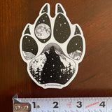 Wolf paw with mountains and full moon. Sticker, wolf paw sticker, wolf paw silhouette sticker, wolf silhouette sticker, paw sticker, wolf howling at full moon sticker