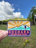 Cuchara Mountain Park sticker, Colorado ski area decal, waterproof vinyl sticker, dishwasher safe decal, water bottle sticker, Cuchara Colorado souvenir, mountain sunburst sticker, Colorado hiking gift, Southern Colorado merch, Spanish Peaks Colorado, hidden spoon design, 10810 elevation mountain, outdoor adventure sticker, laptop decal, retro Colorado mountain art, durable car bumper sticker, Colorado ski resort souvenir, Cuchara Mountain Park merch