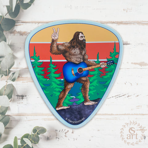 guitar sticker, guitar decal, colorado guitar sticker, acoustic guitar sticker, bigfoot holding a guitar sticker, bigfoot flipping a peace sign sticker, peace bigfoot sticker, guitar pick sticker, yeti sticker, sasquatch sticker, big foot sticker, idaho springs colorado decal, idaho springs colorado sticker, mountain decal, mountain sticker, mountain and river decal, mountain and river sticker, mountain illustration, colorful mountain drawing, colorado sticker, colorado decal