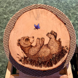 Baby Bear playing with a Butterfly pyrography, Baby Bear playing with a Butterfly wood burning, bear wood burning, bear pyrography, bear cub pyrography, bear cub wood burning, painted butterfly, butterfly pyrography, butterfly wood burning, daisy wood burning