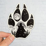 Wolf paw with mountains and full moon. Wolf sticker, wolf paw sticker, wolf paw silhouette sticker, wolf silhouette sticker, paw sticker, wolf howling at full moon sticker, colorado wolf sticker, colorado sticker, mount eva sticker, mountain sticker, colorado mountain sticker, full moon sticker, dog sticker, dog paw print sticker