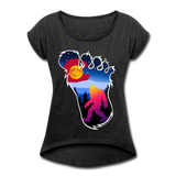 Women's Roll Cuff T-Shirt (50/50) : Colorful Colorado Bigfoot (Level X Hide N Seek Master) - heather black; Colorado Flag with a colorful big foot (yeti) walking in the forest at night. The mountain range is Pikes Peak in Colorado Springs. Colorado flag t-shirt, yeti t-shirt, big foot t-shirt, Bigfoot t-shirt, big foot shirt, yeti shirt, blood moon colorado flag