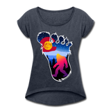Women's Roll Cuff T-Shirt (50/50) : Colorful Colorado Bigfoot (Level X Hide N Seek Master) - navy heather; Colorado Flag with a colorful big foot (yeti) walking in the forest at night. The mountain range is Pikes Peak in Colorado Springs. Colorado flag t-shirt, yeti t-shirt, big foot t-shirt, Bigfoot t-shirt, big foot shirt, yeti shirt, blood moon colorado flag